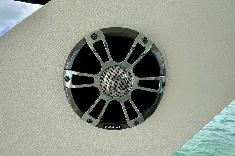 Slide: The Image of Fusion speaker on 2022 Sea Ray Sundancer 320 Outboard, mounted on white panel. - 59