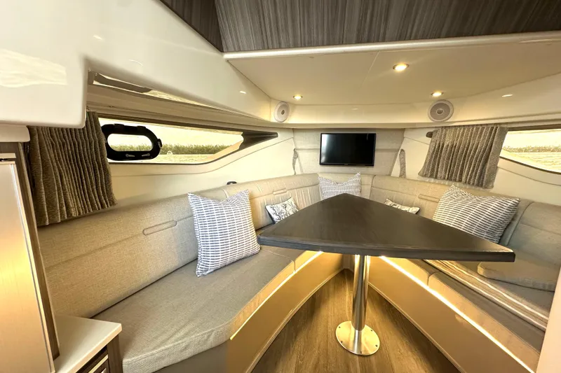 Slide: The Image of Luxurious interior of 2022 Sea Ray Sundancer 320 Outboard with cozy seating and modern amenities. - 67