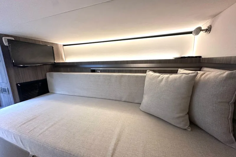 Slide: The Image of Interior cabin of 2022 Sea Ray Sundancer 320 Outboard with cozy seating and modern lighting. - 74