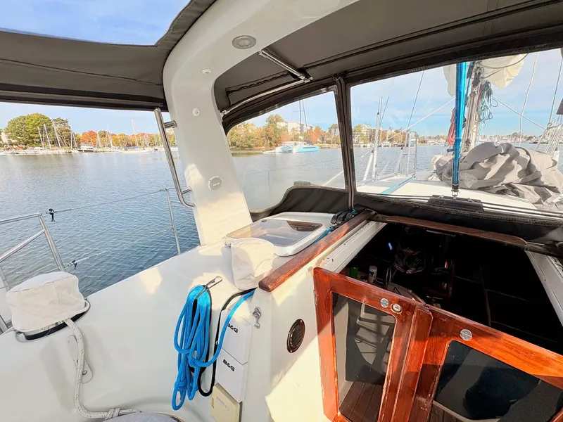 Slide: The Image of Control panel of a 1990 Beneteau 38 sailboat with gauges and switches. - 12