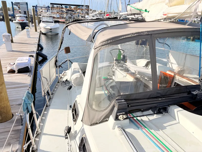 Slide: The Image of Beneteau 38 sailboat cockpit with blue ropes and B&G equipment, 1990 model. - 15