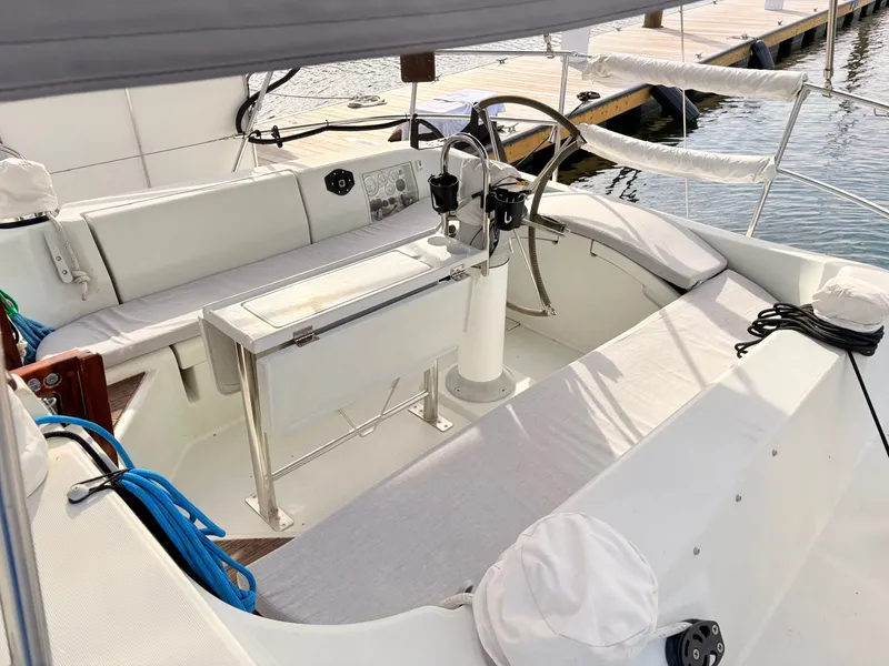 Slide: The Image of Sailboat deck of 1990 Beneteau 38, docked in marina. - 6