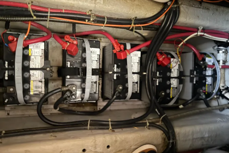 Slide: The Image of Battery compartment of 1999 Carver 406 Aft Cabin Motor Yacht with wiring and connections. - 29