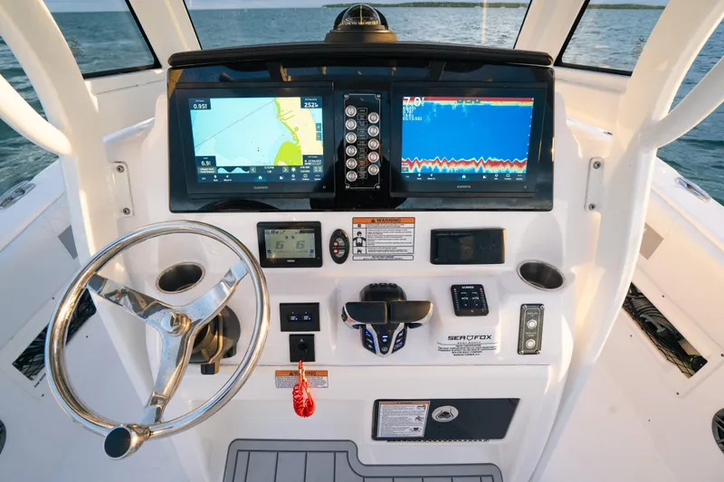 Slide: The Image of 2025 Sea Fox 268 Commander dashboard with advanced navigation and control systems. - 10