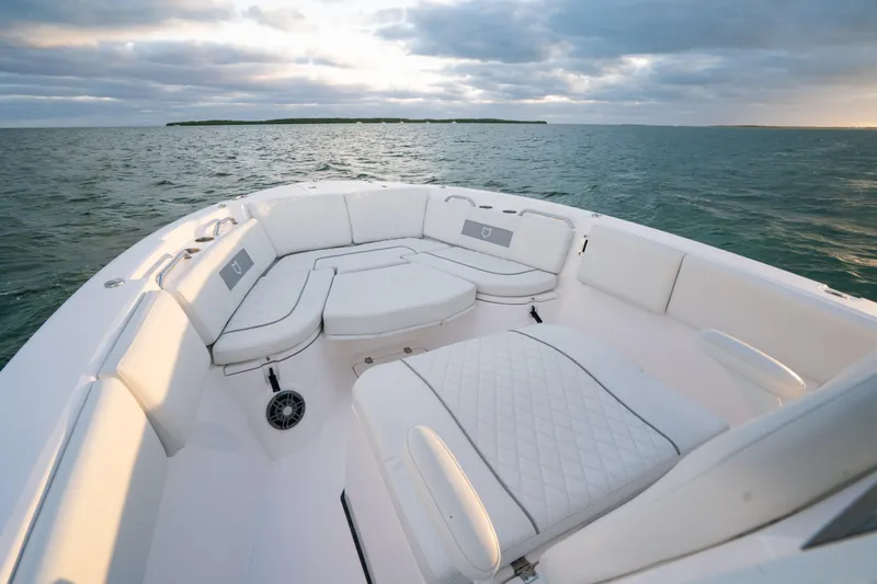 Slide: The Image of 2025 Sea Fox 268 Commander boat interior with luxurious seating on open water. - 12