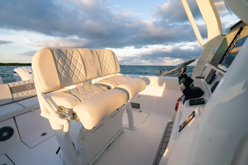 Slide: The Image of 2025 Sea Fox 268 Commander boat interior with luxurious seating and ocean view. - 19
