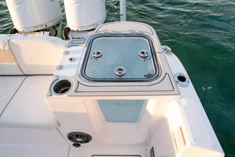 Slide: The Image of 2025 Sea Fox 268 Commander boat with dual outboard motors and deck storage. - 23
