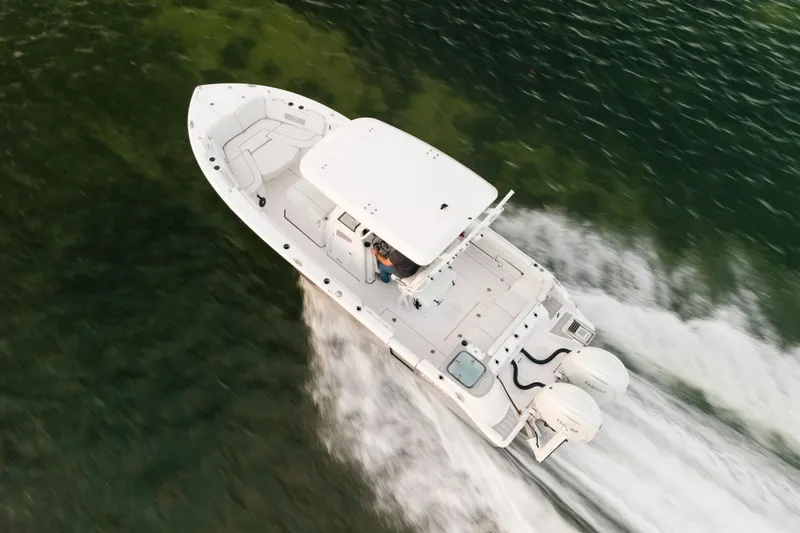 Slide: The Image of Aerial view of 2025 Sea Fox 268 Commander boat cruising on water. - 3