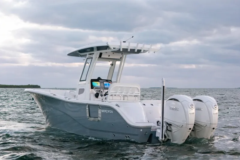 Slide: The Image of 2025 Sea Fox 268 Commander boat on open water, featuring dual Yamaha engines. - 4