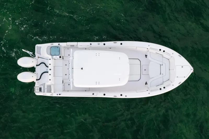 Slide: The Image of Top view of 2025 Sea Fox 268 Commander boat on green water. - 5
