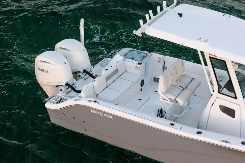 Slide: The Image of 2025 Sea Fox 268 Commander boat with Yamaha engines on water. - 7