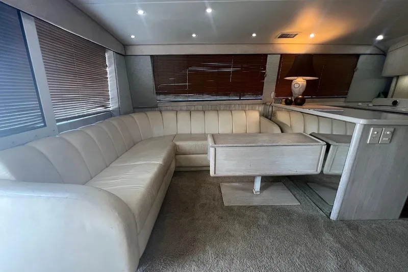 Slide: The Image of Luxurious 1996 Ocean Yachts 48 Super Sport interior with modern kitchen and elegant decor. - 10