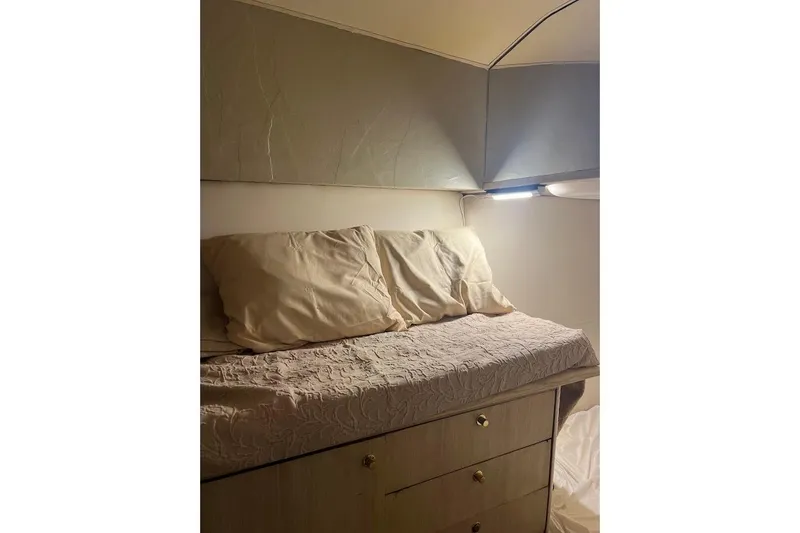 Slide: The Image of 1996 Ocean Yachts 48 Super Sport interior with compact laundry area. - 29