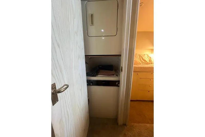 Slide: The Image of Engine room of a 1996 Ocean Yachts 48 Super Sport, showcasing dual engines. - 30