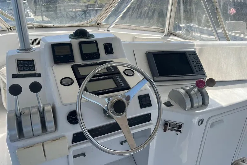Slide: The Image of GPS navigation screen on a 1996 Ocean Yachts 48 Super Sport, displaying map and coordinates. - 37
