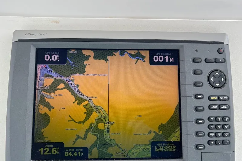 Slide: The Image of Fishfinder display on 1996 Ocean Yachts 48 Super Sport, showing depth and water temperature. - 38