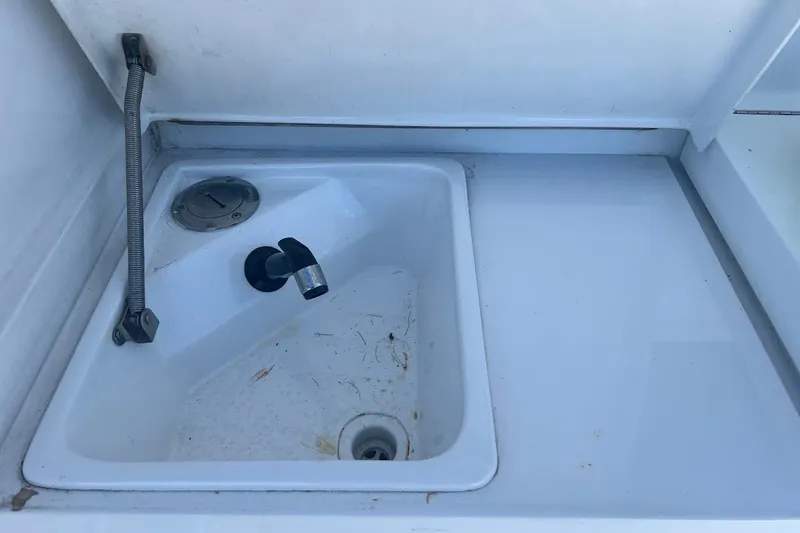 Slide: The Image of Clean sink area on 1996 Ocean Yachts 48 Super Sport boat. - 48