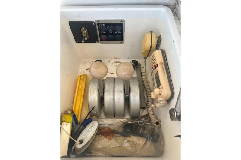 Slide: The Image of Control panel and equipment inside a 1996 Ocean Yachts 48 Super Sport boat. - 49