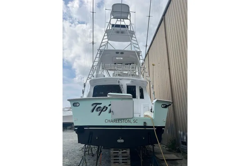 Slide: The Image of 1996 Ocean Yachts 48 Super Sport docked in Charleston, SC, rear view. - 51
