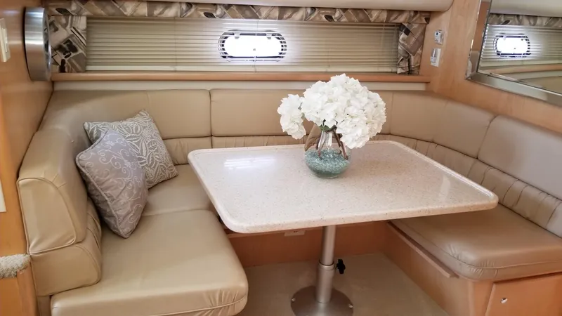 Slide: The Image of Luxurious 1998 Carver 445 Aft Cabin Motor Yacht interior with elegant dining area. - 28