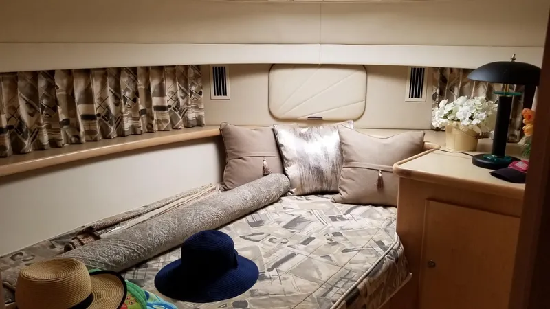 Slide: The Image of Cozy cabin interior of 1998 Carver 445 Aft Cabin Motor Yacht with stylish decor. - 36