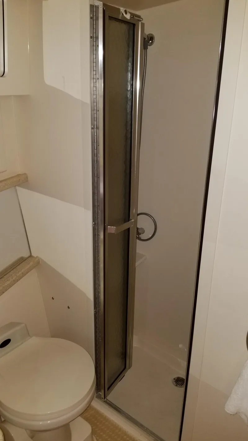 Slide: The Image of Bathroom in 1998 Carver 445 Aft Cabin Motor Yacht with shower and toilet. - 39