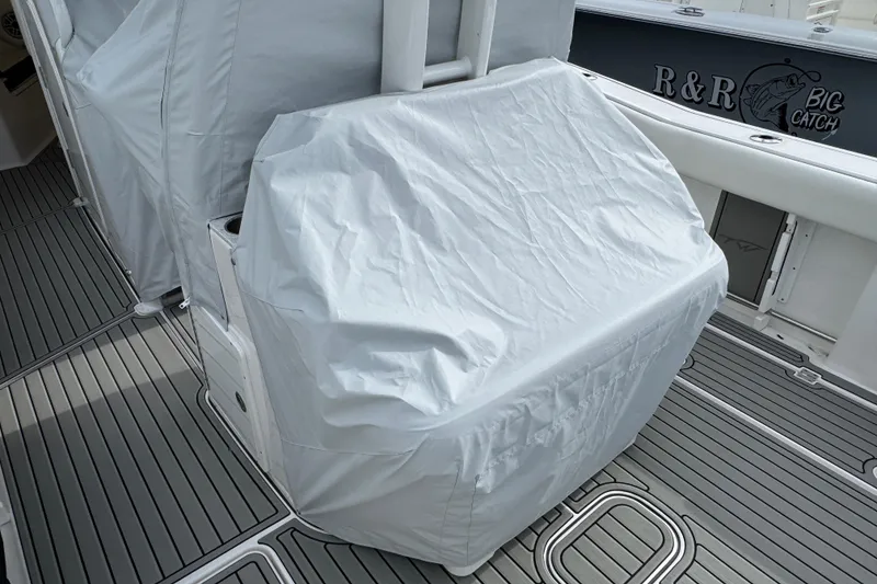 Slide: The Image of Covered console on 2025 Tidewater 302 CC Adventure boat deck. - 114