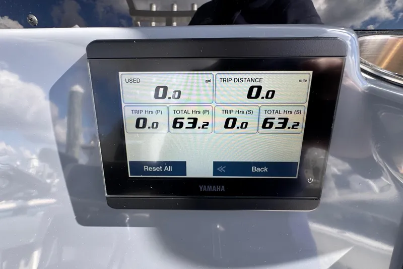 Slide: The Image of Yamaha display on 2025 Tidewater 302 CC Adventure showing trip and usage data. - 46