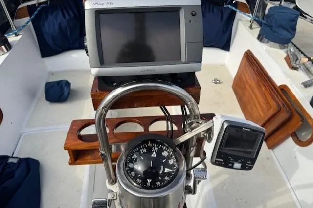Slide: The Image of Cockpit of 1982 Catalina 38 sailboat with navigation instruments and compass. - 10