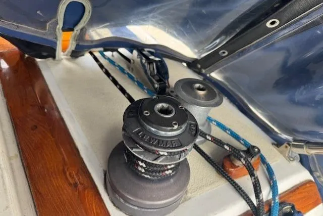 Slide: The Image of Winch and ropes on 1982 Catalina 38 sailboat deck, under blue canopy. - 16