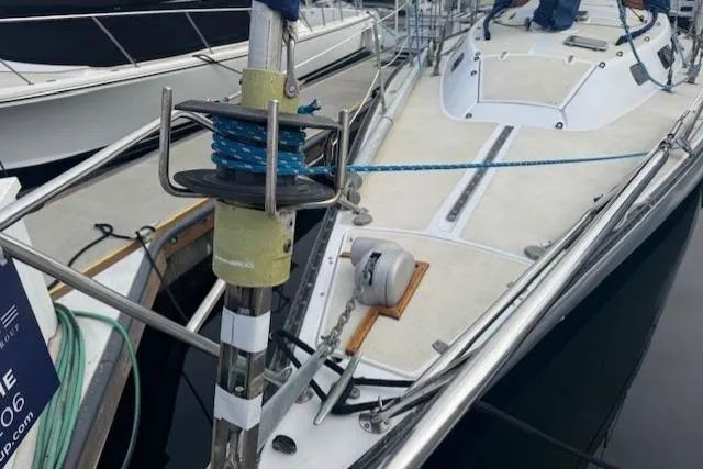 Slide: The Image of 1982 Catalina 38 sailboat deck with rigging and mooring lines. - 2