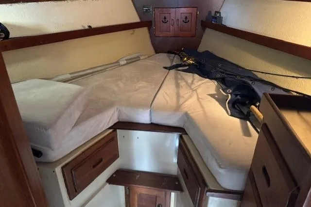 Slide: The Image of Interior cabin of a 1982 Catalina 38 sailboat with a cozy V-berth. - 31
