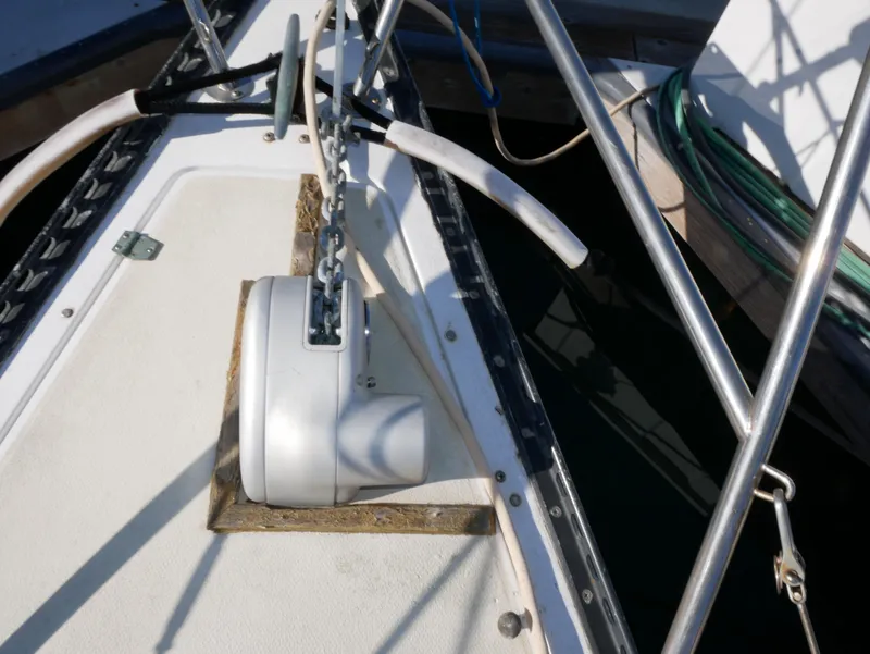 Slide: The Image of Anchor chain and windlass on 1982 Catalina 38 sailboat deck. - 9