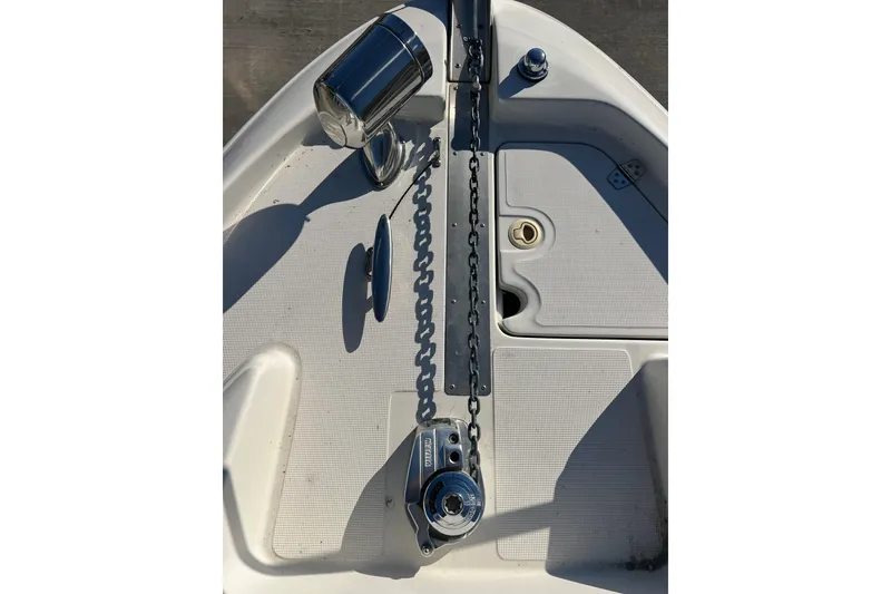 Slide: The Image of Bow of 2002 Regal Commodore 2765 with anchor chain and winch system. - 18