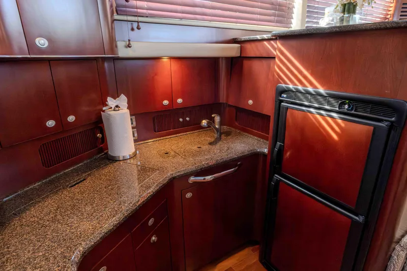 Slide: The Image of Luxurious interior of 2006 Sea Ray 40 Motor Yacht with elegant seating and decor. - 17