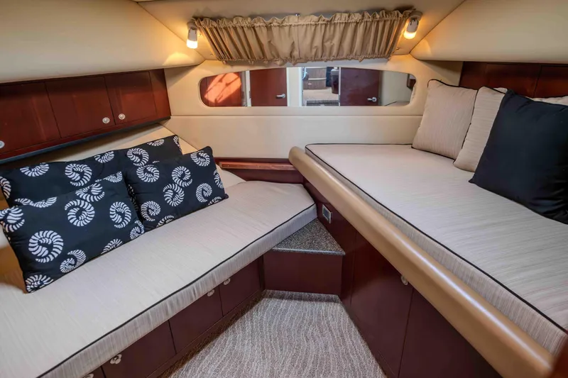 Slide: The Image of Luxurious 2006 Sea Ray 40 Motor Yacht interior with plush seating and entertainment area. - 21