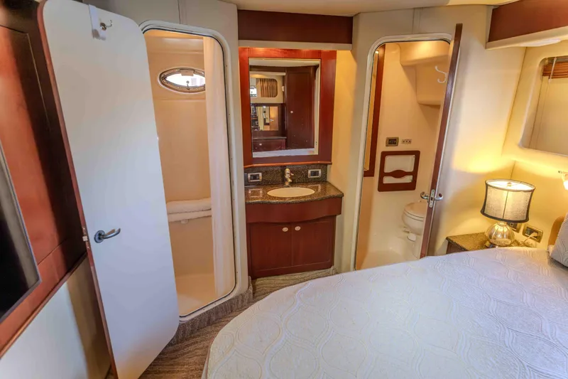 Slide: The Image of Interior of 2006 Sea Ray 40 Motor Yacht with bathroom and bedroom amenities. - 33