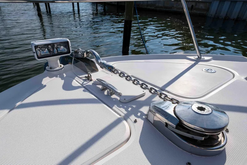 Slide: The Image of 2006 Sea Ray 40 Motor Yacht docked in clear green water, aerial view. - 4