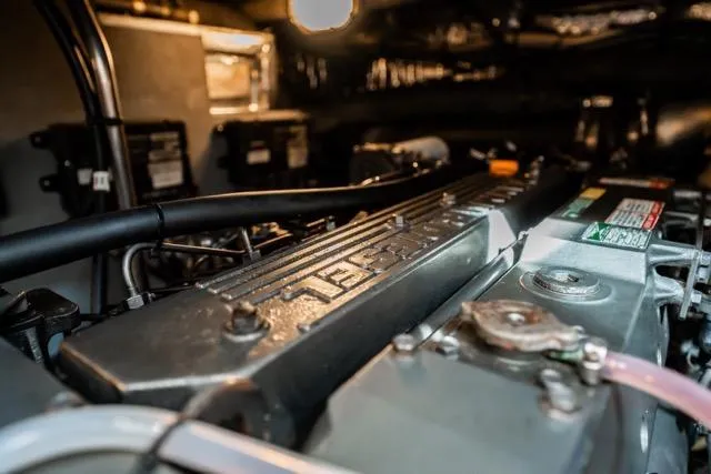 Slide: The Image of Engine room of 2005 Cruiser Yachts 405 EXPRESS, showcasing detailed mechanical components. - 108