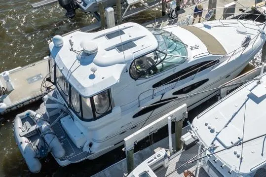 Slide: The Image of 2005 Cruiser Yachts 405 EXPRESS docked at marina, aerial view. - 116