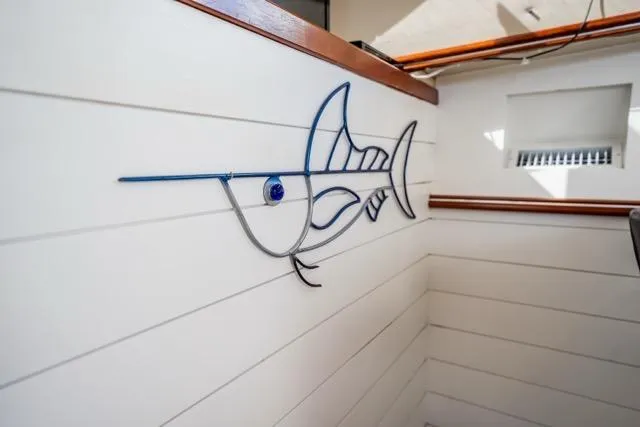 Slide: The Image of Wall art of a fish on a 2005 Cruiser Yachts 405 EXPRESS boat interior. - 19