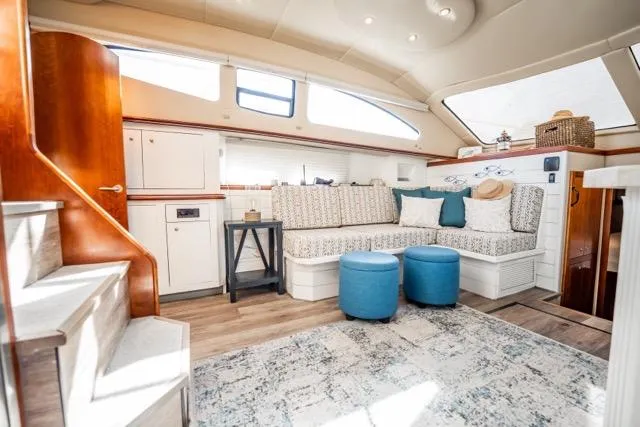 Slide: The Image of Luxurious interior of 2005 Cruiser Yachts 405 EXPRESS with elegant seating and modern decor. - 22