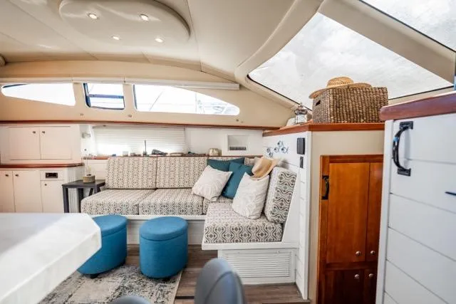 Slide: The Image of Luxurious interior of 2005 Cruiser Yachts 405 EXPRESS with elegant seating and decor. - 27