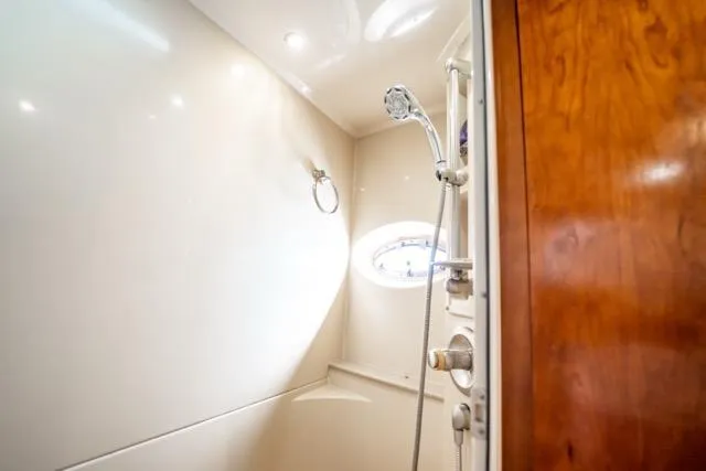 Slide: The Image of Shower area in 2005 Cruiser Yachts 405 EXPRESS, featuring sleek design and modern fixtures. - 33