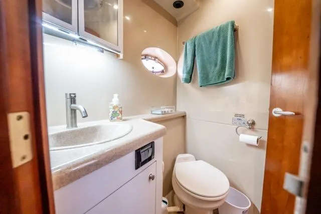 Slide: The Image of Luxurious bathroom in 2005 Cruiser Yachts 405 EXPRESS with modern amenities. - 48