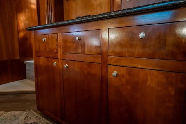 Slide: The Image of Wooden cabinetry in 2005 Cruiser Yachts 405 EXPRESS, featuring sleek metal handles. - 67