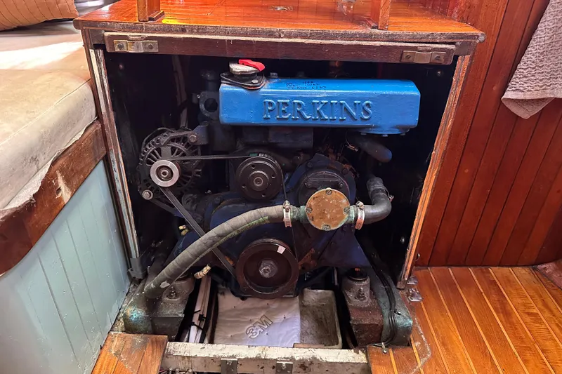 Slide: The Image of Perkins engine inside 1978 Tayana 37 sailboat, showcasing marine engineering. - 29