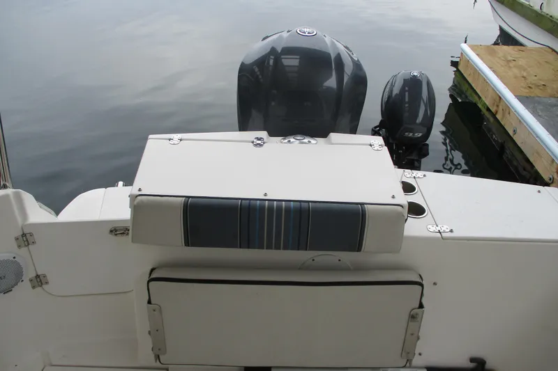 Slide: The Image of 2018 Cutwater C-24 boat stern with dual outboard motors and seating. - 10