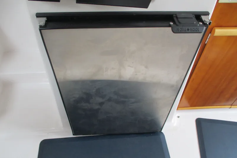 Slide: The Image of Nova Kool refrigerator in 2018 Cutwater C-24 boat interior. - 28