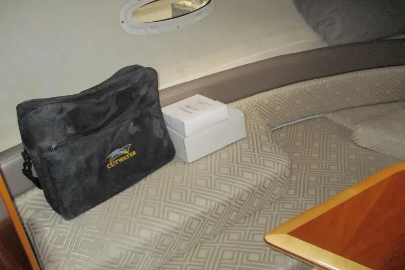 Slide: The Image of Interior of 2018 Cutwater C-24 boat with branded bag and patterned seating. - 32